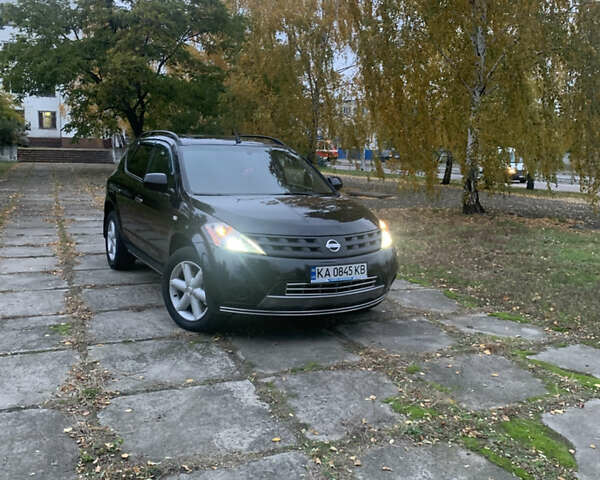 Черный Ниссан Мурано, объемом двигателя 3.5 л и пробегом 282 тыс. км за 7500 $, фото 11 на Automoto.ua