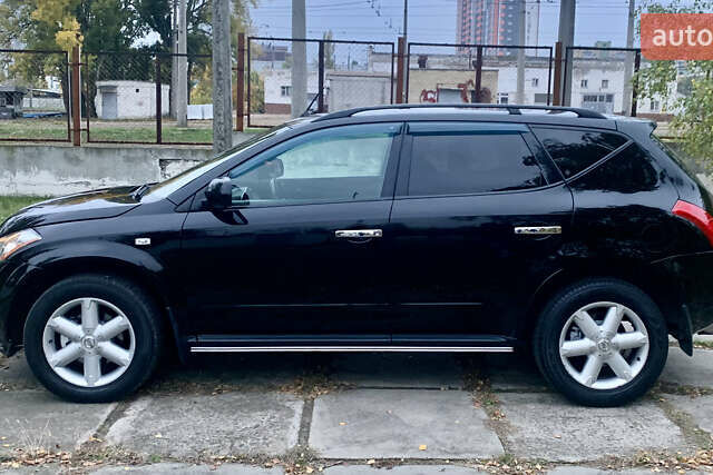 Черный Ниссан Мурано, объемом двигателя 3.5 л и пробегом 282 тыс. км за 7500 $, фото 5 на Automoto.ua