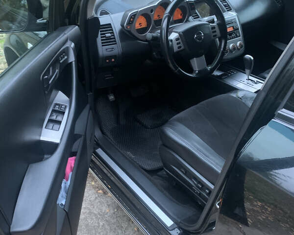 Черный Ниссан Мурано, объемом двигателя 3.5 л и пробегом 282 тыс. км за 7500 $, фото 17 на Automoto.ua