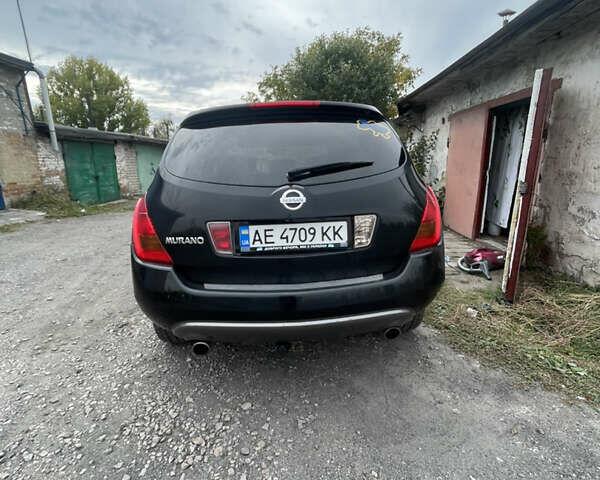 Черный Ниссан Мурано, объемом двигателя 3.5 л и пробегом 290 тыс. км за 6500 $, фото 4 на Automoto.ua
