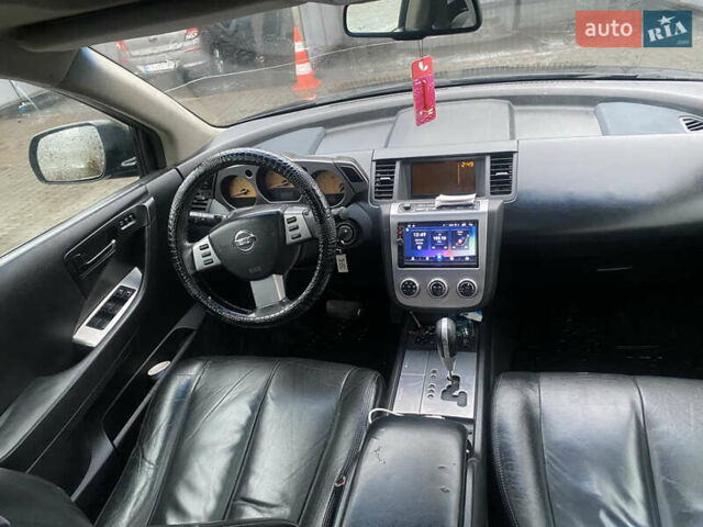 Черный Ниссан Мурано, объемом двигателя 3.5 л и пробегом 317 тыс. км за 5500 $, фото 8 на Automoto.ua