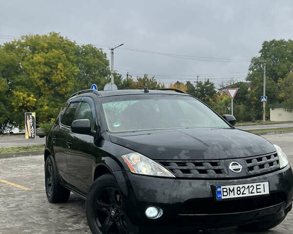 Черный Ниссан Мурано, объемом двигателя 3.5 л и пробегом 250 тыс. км за 6100 $, фото 3 на Automoto.ua