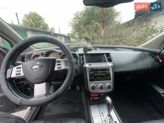 Черный Ниссан Мурано, объемом двигателя 3.5 л и пробегом 290 тыс. км за 6500 $, фото 10 на Automoto.ua