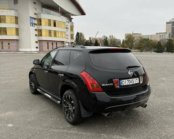 Черный Ниссан Мурано, объемом двигателя 3.5 л и пробегом 230 тыс. км за 6999 $, фото 7 на Automoto.ua