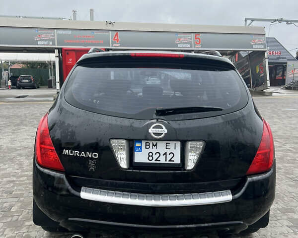 Черный Ниссан Мурано, объемом двигателя 3.5 л и пробегом 250 тыс. км за 6100 $, фото 4 на Automoto.ua