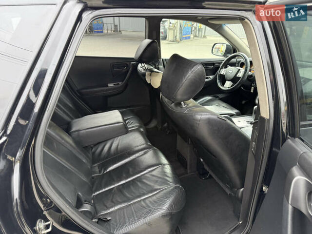 Черный Ниссан Мурано, объемом двигателя 3.5 л и пробегом 317 тыс. км за 4200 $, фото 9 на Automoto.ua