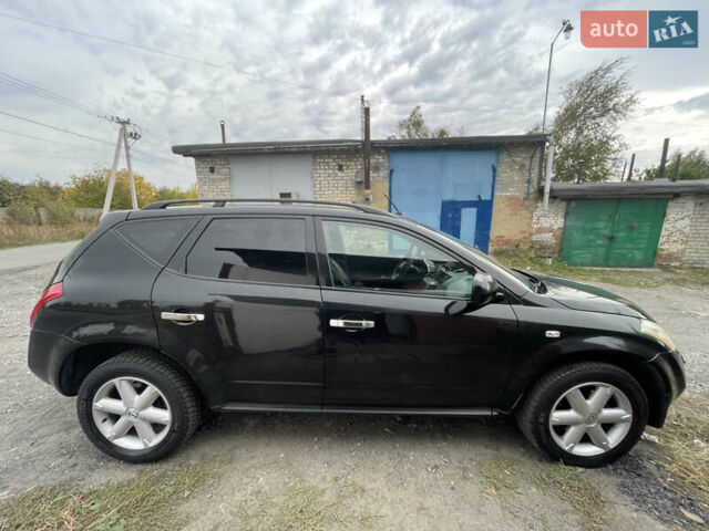 Черный Ниссан Мурано, объемом двигателя 3.5 л и пробегом 290 тыс. км за 6500 $, фото 5 на Automoto.ua