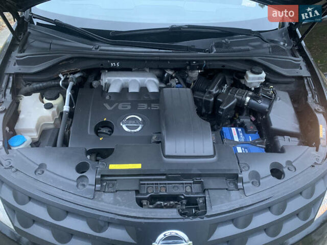 Черный Ниссан Мурано, объемом двигателя 3.5 л и пробегом 282 тыс. км за 7500 $, фото 16 на Automoto.ua