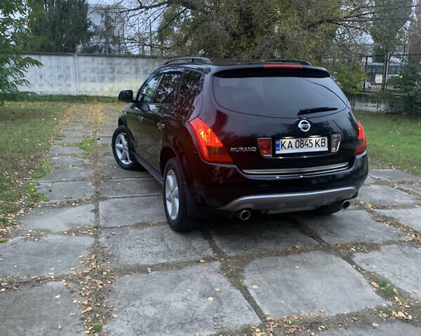 Черный Ниссан Мурано, объемом двигателя 3.5 л и пробегом 282 тыс. км за 7500 $, фото 13 на Automoto.ua
