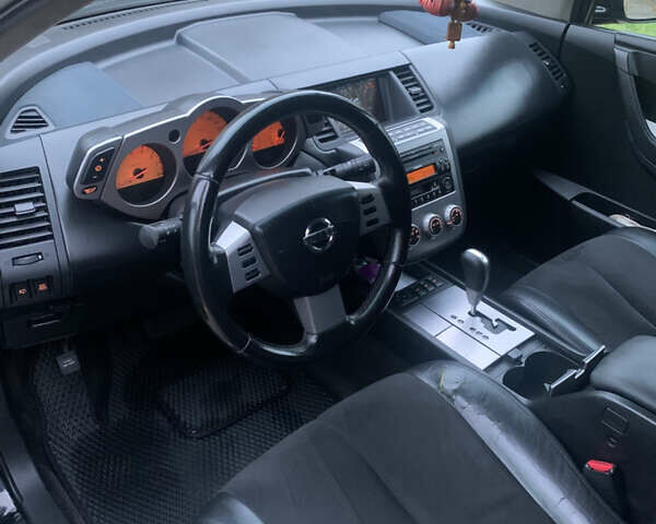 Черный Ниссан Мурано, объемом двигателя 3.5 л и пробегом 282 тыс. км за 7500 $, фото 18 на Automoto.ua