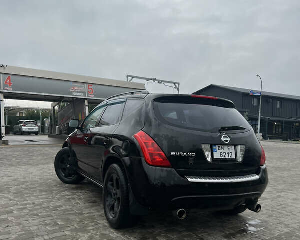 Черный Ниссан Мурано, объемом двигателя 3.5 л и пробегом 250 тыс. км за 6100 $, фото 7 на Automoto.ua
