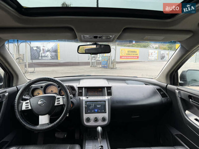 Черный Ниссан Мурано, объемом двигателя 3.5 л и пробегом 317 тыс. км за 4200 $, фото 5 на Automoto.ua