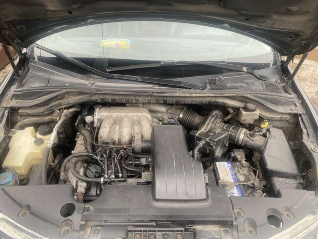 Черный Ниссан Мурано, объемом двигателя 3.5 л и пробегом 317 тыс. км за 6000 $, фото 9 на Automoto.ua