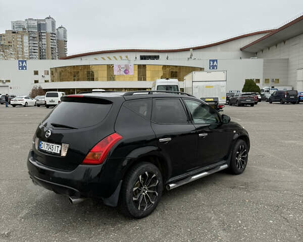 Черный Ниссан Мурано, объемом двигателя 3.5 л и пробегом 230 тыс. км за 6999 $, фото 6 на Automoto.ua