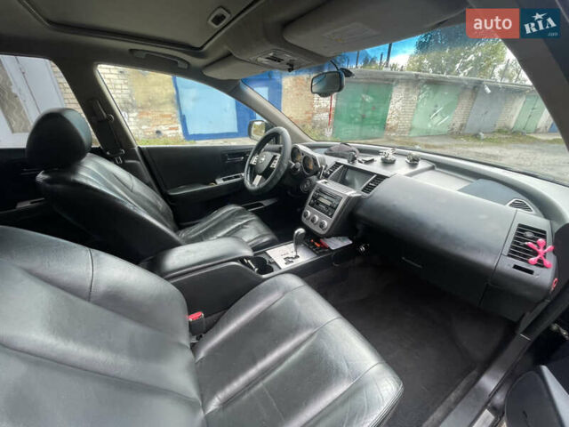 Черный Ниссан Мурано, объемом двигателя 3.5 л и пробегом 290 тыс. км за 6500 $, фото 6 на Automoto.ua