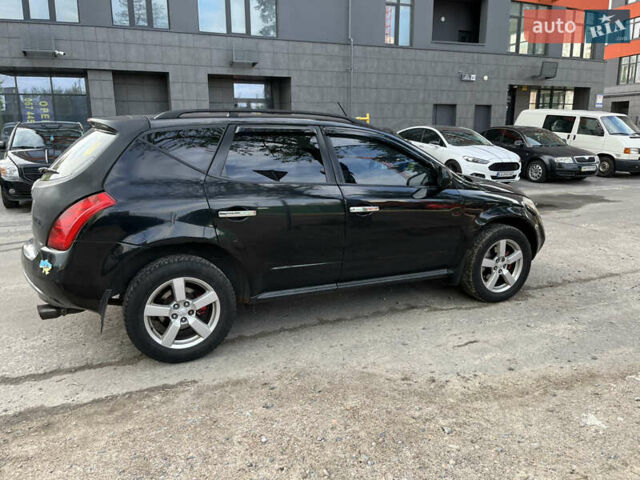 Черный Ниссан Мурано, объемом двигателя 3.5 л и пробегом 188 тыс. км за 4500 $, фото 4 на Automoto.ua