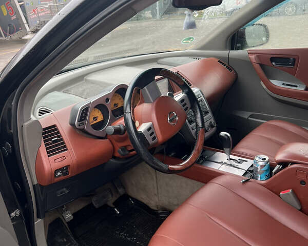 Черный Ниссан Мурано, объемом двигателя 3.5 л и пробегом 250 тыс. км за 6100 $, фото 5 на Automoto.ua