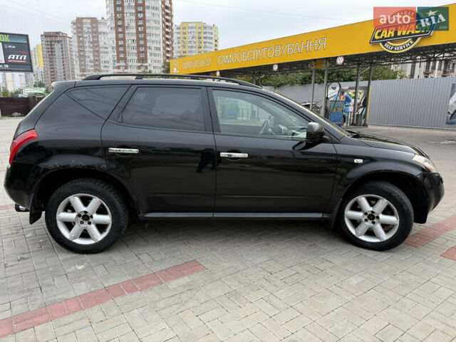 Черный Ниссан Мурано, объемом двигателя 3.5 л и пробегом 317 тыс. км за 4200 $, фото 4 на Automoto.ua