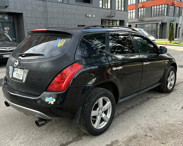 Черный Ниссан Мурано, объемом двигателя 3.5 л и пробегом 188 тыс. км за 4500 $, фото 7 на Automoto.ua