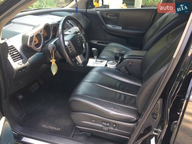 Черный Ниссан Мурано, объемом двигателя 3.5 л и пробегом 188 тыс. км за 9000 $, фото 3 на Automoto.ua