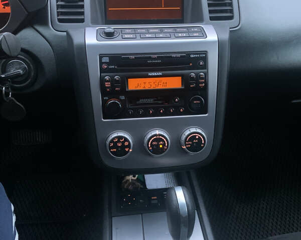 Черный Ниссан Мурано, объемом двигателя 3.5 л и пробегом 282 тыс. км за 7500 $, фото 21 на Automoto.ua