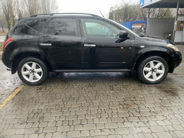 Черный Ниссан Мурано, объемом двигателя 3.5 л и пробегом 317 тыс. км за 6000 $, фото 6 на Automoto.ua