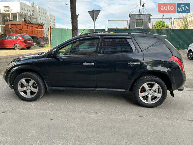 Черный Ниссан Мурано, объемом двигателя 3.5 л и пробегом 188 тыс. км за 4500 $, фото 3 на Automoto.ua