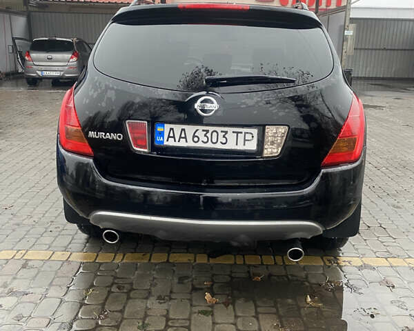 Черный Ниссан Мурано, объемом двигателя 3.5 л и пробегом 317 тыс. км за 5500 $, фото 4 на Automoto.ua