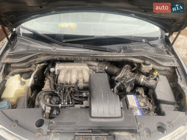 Черный Ниссан Мурано, объемом двигателя 3.5 л и пробегом 317 тыс. км за 5500 $, фото 9 на Automoto.ua