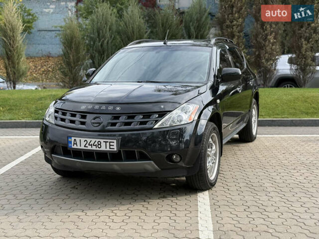 Черный Ниссан Мурано, объемом двигателя 3.5 л и пробегом 238 тыс. км за 6500 $, фото 9 на Automoto.ua