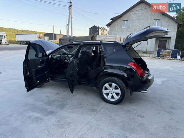 Черный Ниссан Мурано, объемом двигателя 3.5 л и пробегом 240 тыс. км за 5350 $, фото 39 на Automoto.ua