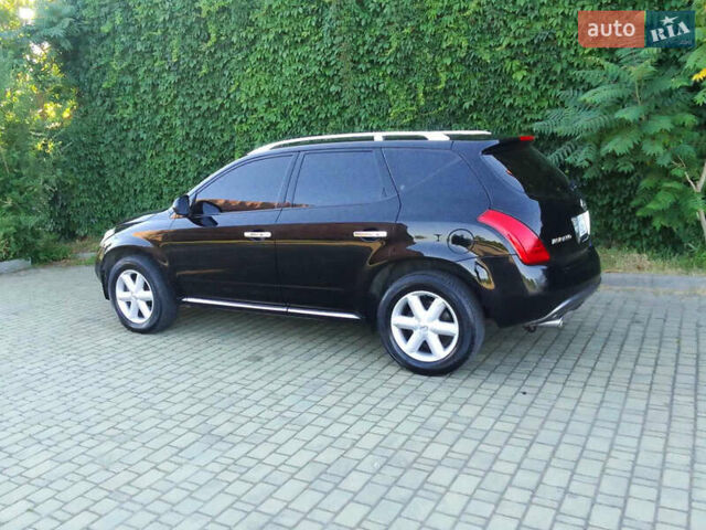 Черный Ниссан Мурано, объемом двигателя 3.5 л и пробегом 235 тыс. км за 6800 $, фото 5 на Automoto.ua