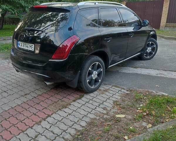 Черный Ниссан Мурано, объемом двигателя 3.5 л и пробегом 260 тыс. км за 8500 $, фото 2 на Automoto.ua