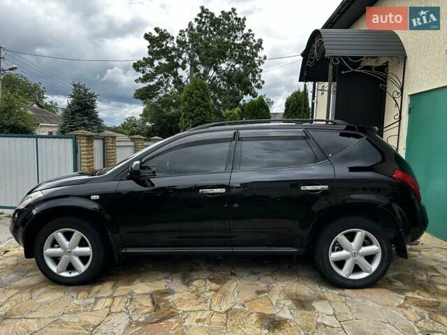 Черный Ниссан Мурано, объемом двигателя 3.5 л и пробегом 86 тыс. км за 7900 $, фото 18 на Automoto.ua