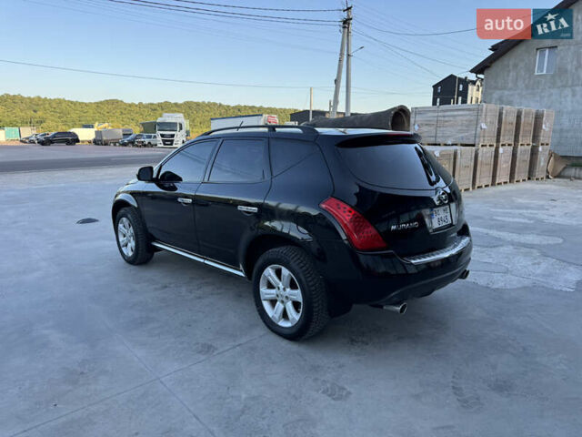 Черный Ниссан Мурано, объемом двигателя 3.5 л и пробегом 240 тыс. км за 5350 $, фото 10 на Automoto.ua