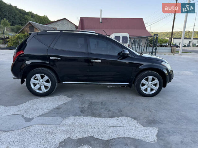 Черный Ниссан Мурано, объемом двигателя 3.5 л и пробегом 240 тыс. км за 5350 $, фото 6 на Automoto.ua