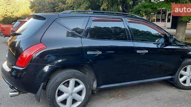 Черный Ниссан Мурано, объемом двигателя 3.5 л и пробегом 290 тыс. км за 7400 $, фото 42 на Automoto.ua