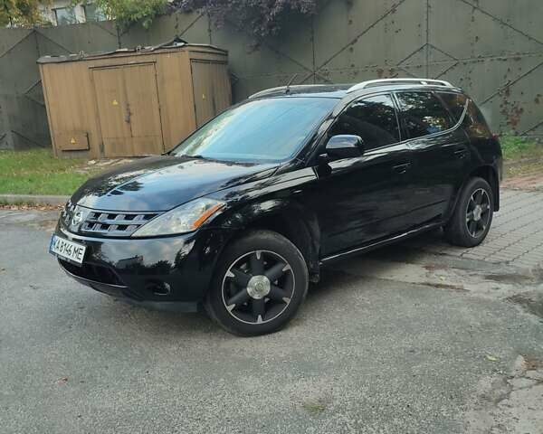 Черный Ниссан Мурано, объемом двигателя 3.5 л и пробегом 260 тыс. км за 8500 $, фото 4 на Automoto.ua