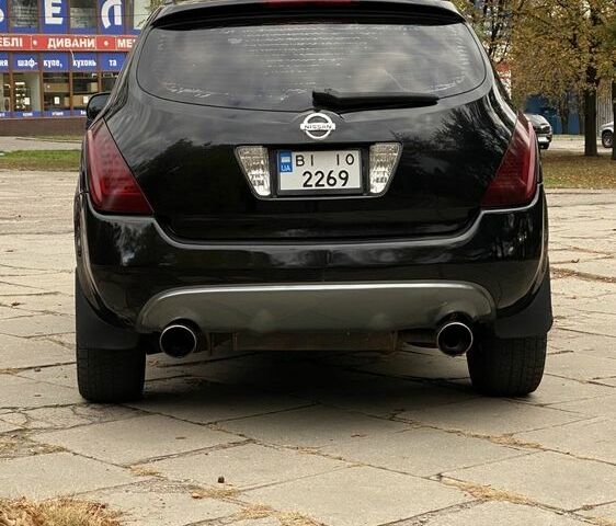 Чорний Ніссан Мурано, об'ємом двигуна 3.5 л та пробігом 259 тис. км за 4700 $, фото 6 на Automoto.ua