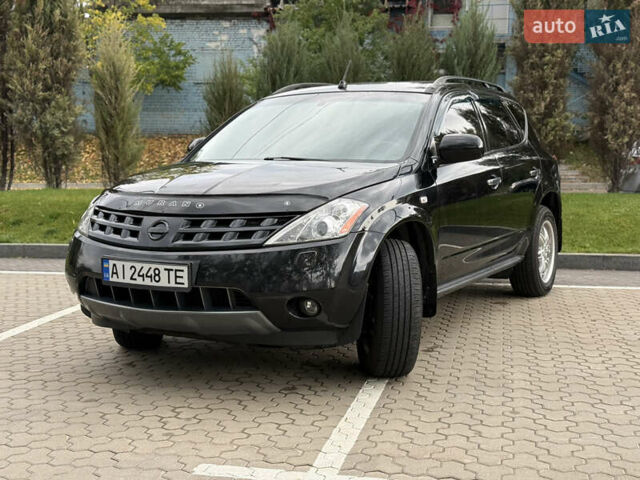 Черный Ниссан Мурано, объемом двигателя 3.5 л и пробегом 238 тыс. км за 6500 $, фото 8 на Automoto.ua