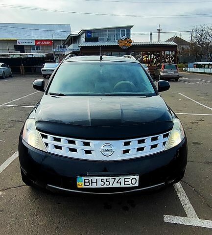 Черный Ниссан Мурано, объемом двигателя 3.5 л и пробегом 157 тыс. км за 6800 $, фото 1 на Automoto.ua