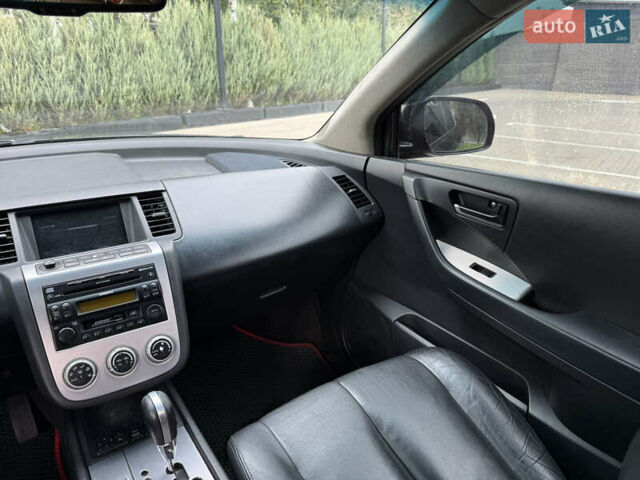 Черный Ниссан Мурано, объемом двигателя 3.5 л и пробегом 238 тыс. км за 6500 $, фото 30 на Automoto.ua