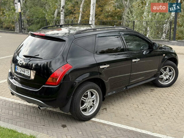 Черный Ниссан Мурано, объемом двигателя 3.5 л и пробегом 238 тыс. км за 6500 $, фото 24 на Automoto.ua