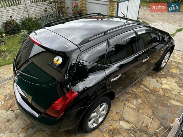 Черный Ниссан Мурано, объемом двигателя 3.5 л и пробегом 86 тыс. км за 7900 $, фото 20 на Automoto.ua