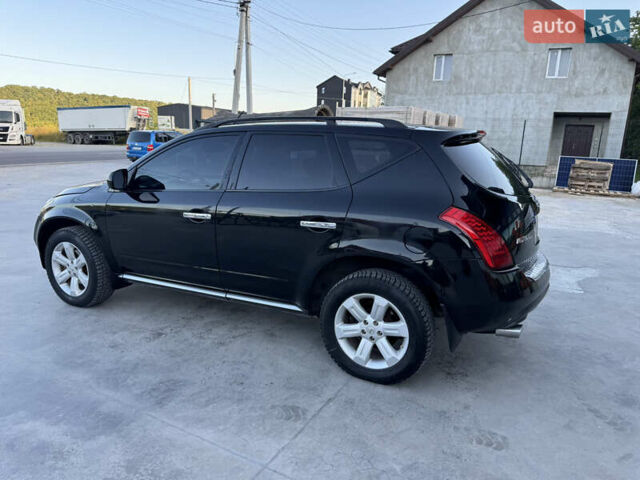 Черный Ниссан Мурано, объемом двигателя 3.5 л и пробегом 240 тыс. км за 5350 $, фото 9 на Automoto.ua
