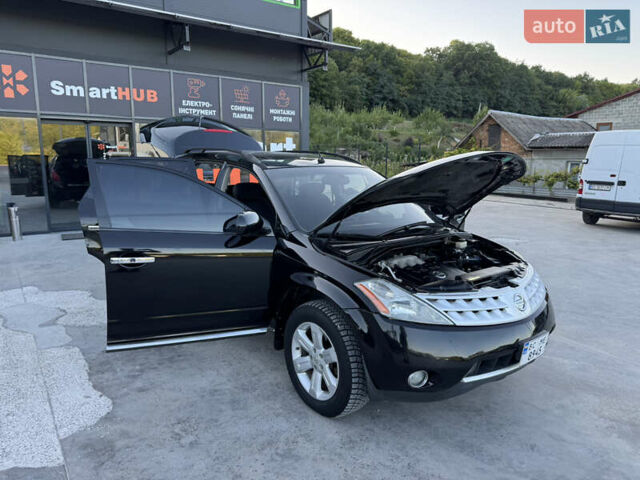 Черный Ниссан Мурано, объемом двигателя 3.5 л и пробегом 240 тыс. км за 5350 $, фото 32 на Automoto.ua