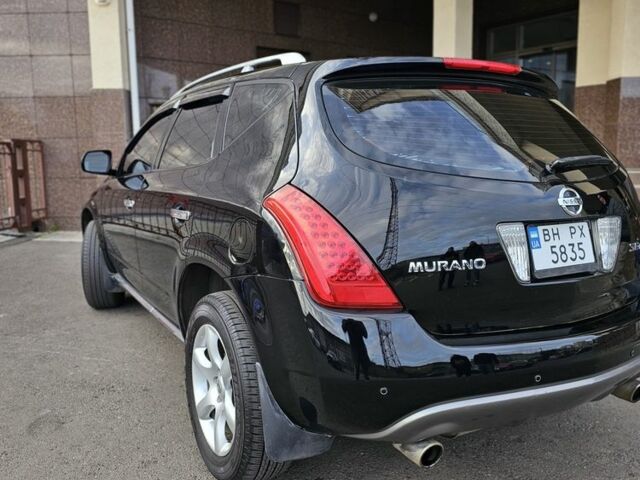 Черный Ниссан Мурано, объемом двигателя 3.5 л и пробегом 185 тыс. км за 5800 $, фото 1 на Automoto.ua