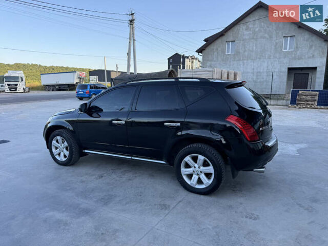 Черный Ниссан Мурано, объемом двигателя 3.5 л и пробегом 240 тыс. км за 5350 $, фото 14 на Automoto.ua