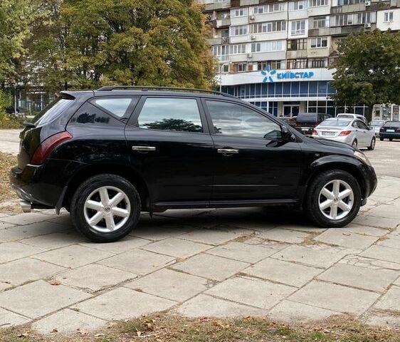 Чорний Ніссан Мурано, об'ємом двигуна 3.5 л та пробігом 259 тис. км за 4700 $, фото 4 на Automoto.ua