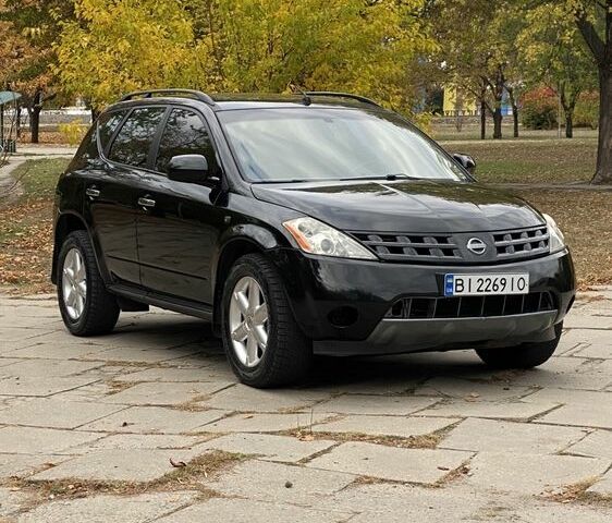 Чорний Ніссан Мурано, об'ємом двигуна 3.5 л та пробігом 259 тис. км за 4700 $, фото 8 на Automoto.ua